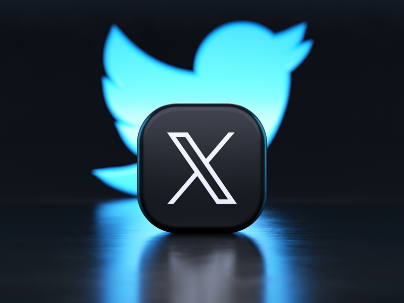 Valencia, Spain - July, 2023:  app logo in front of the Twitter blue bird symbol background in 3D rendering.  is the new name and logo of the social network Twitter owned by Elon Musk